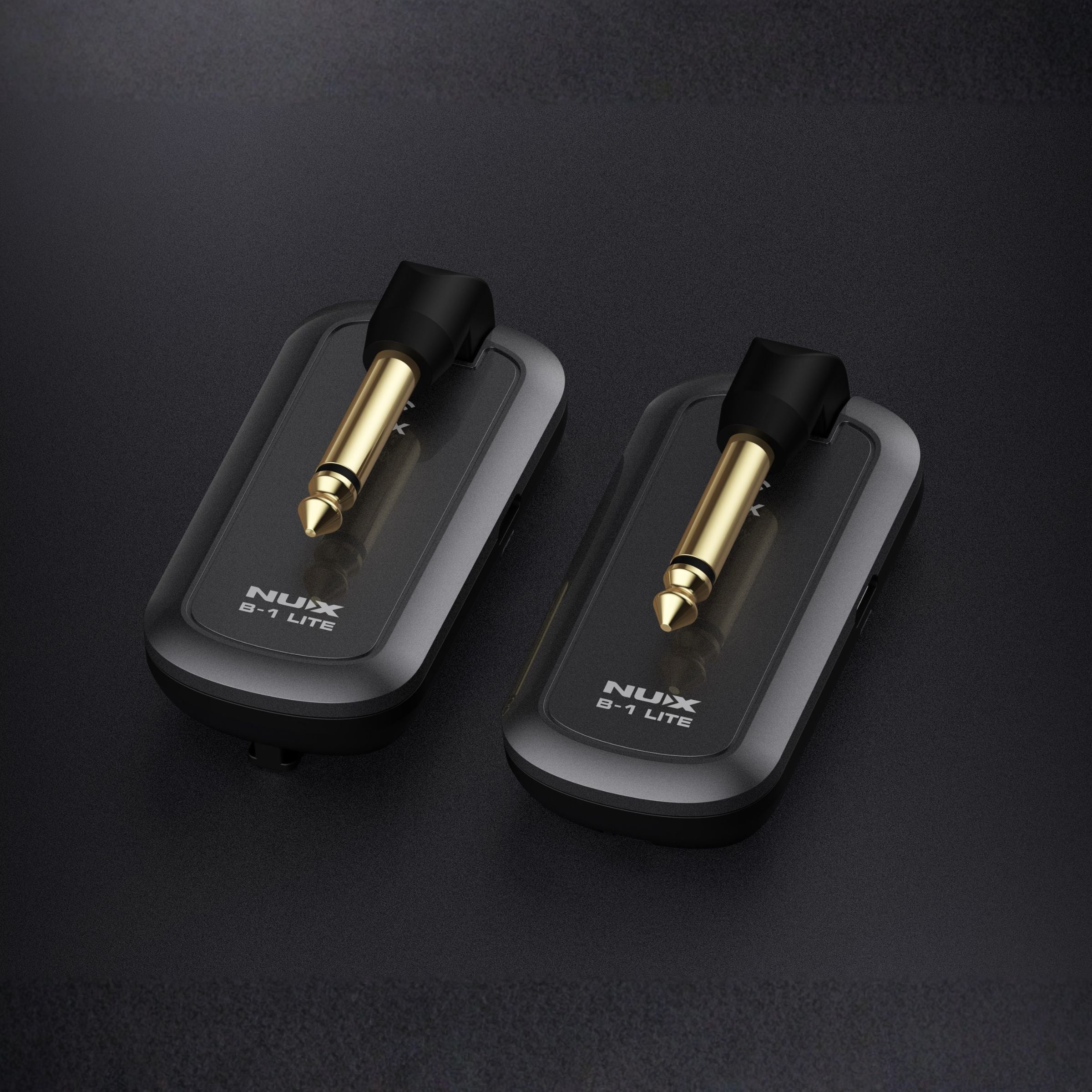 NUX B-1 LITE wireless guitar transmitter and receiver on a dark background