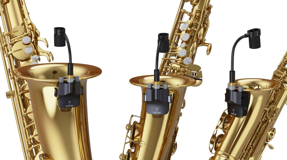 Three gold saxophones with NUX b-6 wireless microphone attachments on a white background