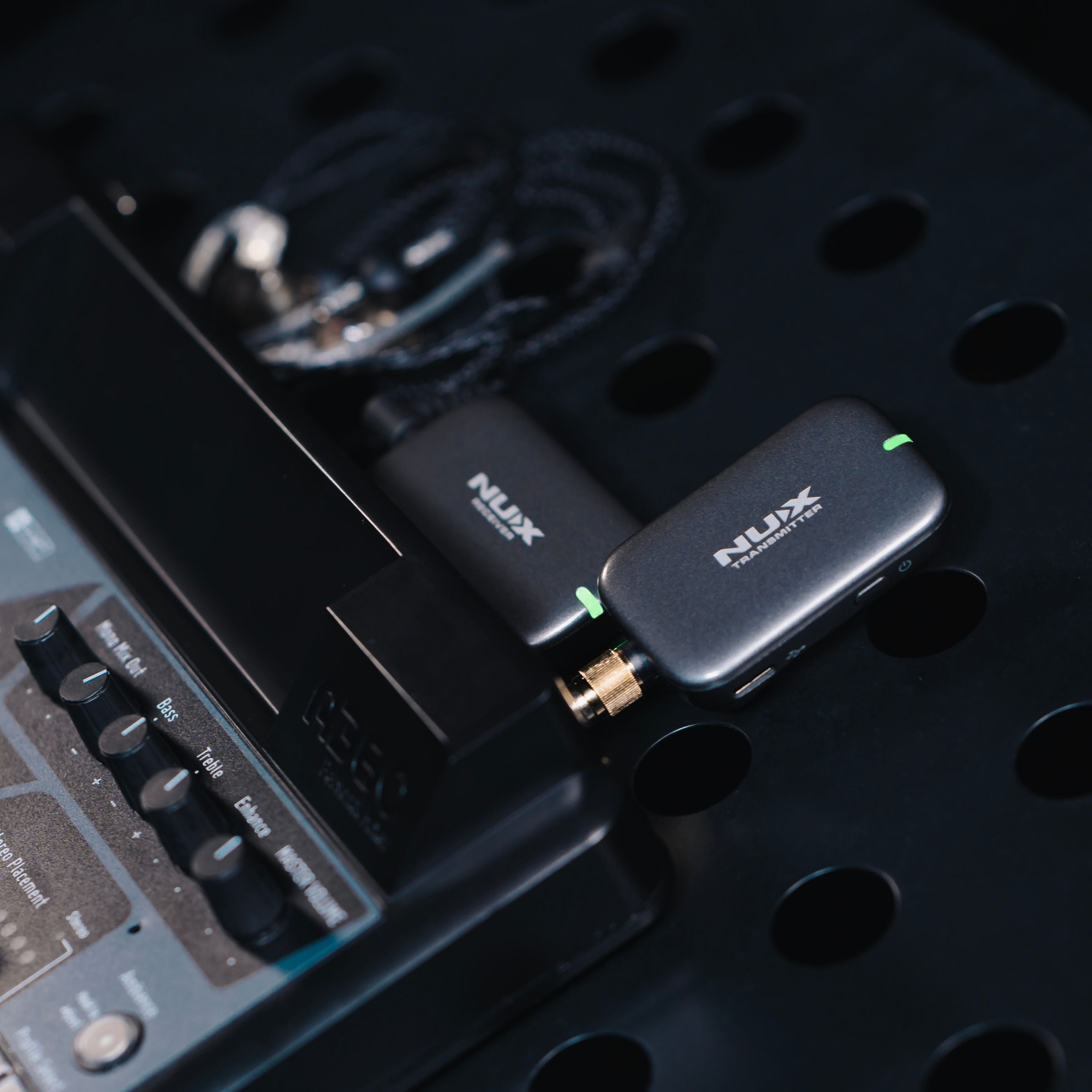 NUX B-7 PSM wireless guitar kit with receiver plugged into the mixer.