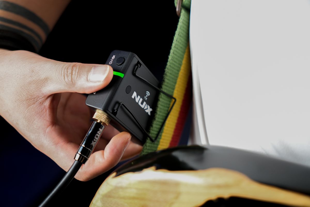 NUX B-8 transmitter clips on guitar strap