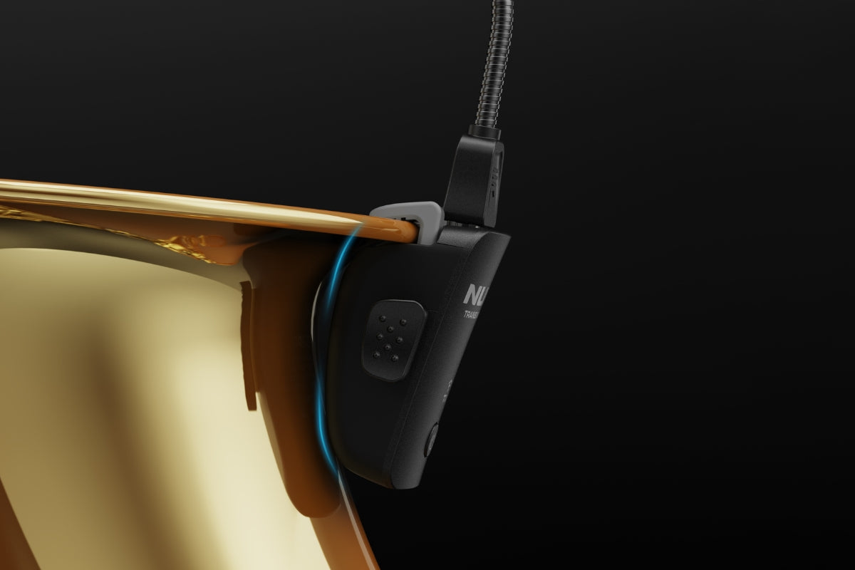 Close up on the rim of the saxophone showing how the B-6 pro transmitter sits on its surface.