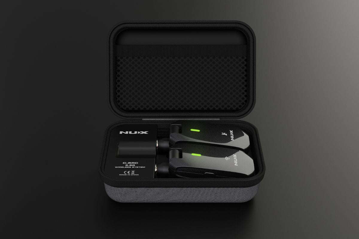 NUX C-5RC charging case with both transmitter and receiver plugged in