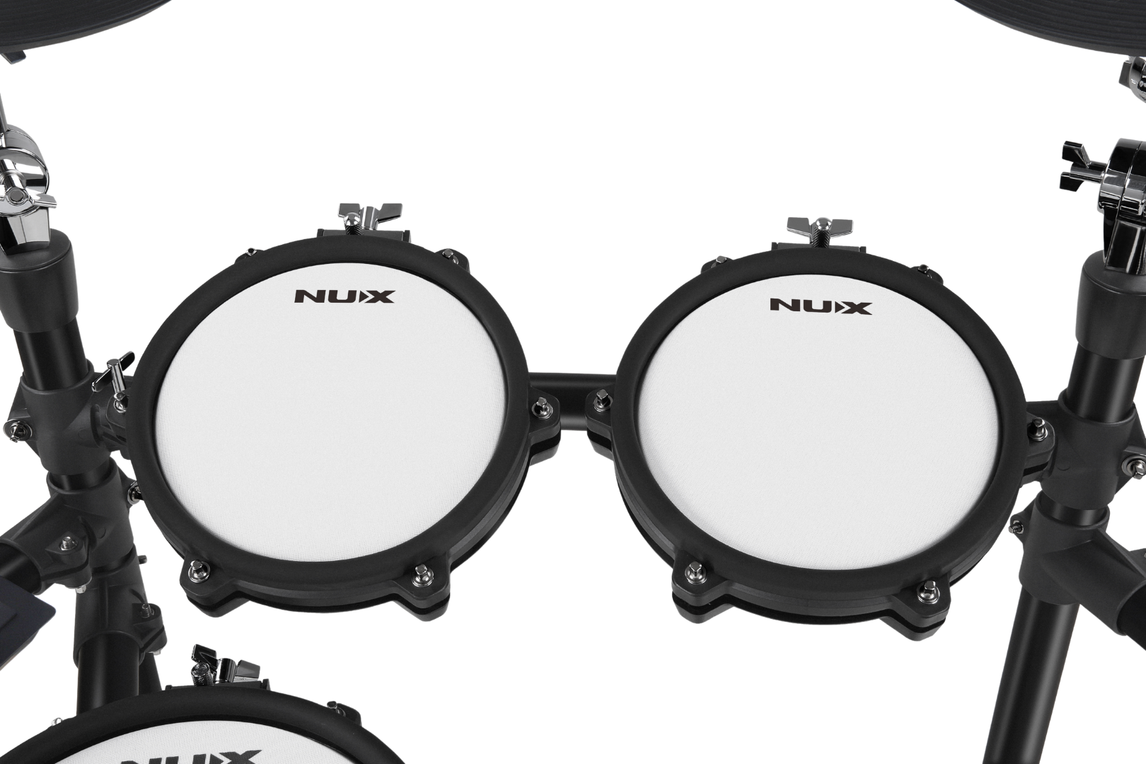 Close-up of NUX electronic drum pads on a white background