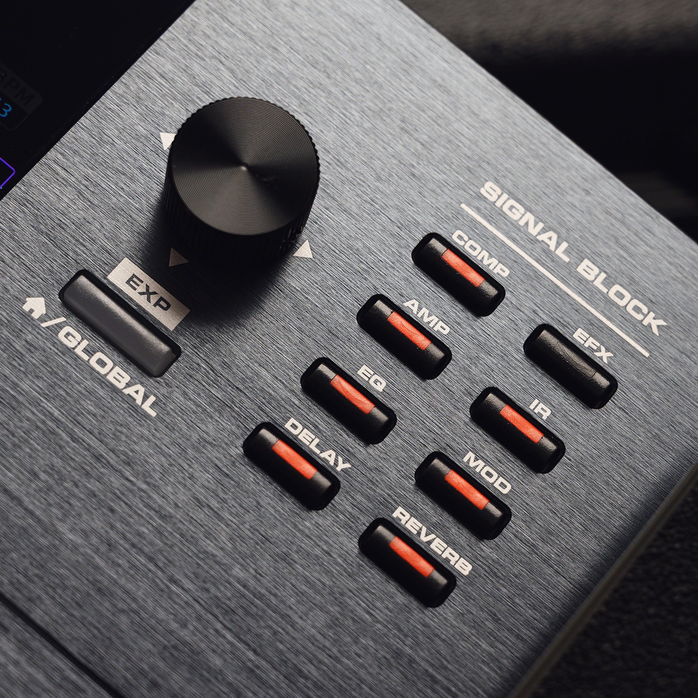 Control panel of a signal block with various control knobs and labels on a gray surface.