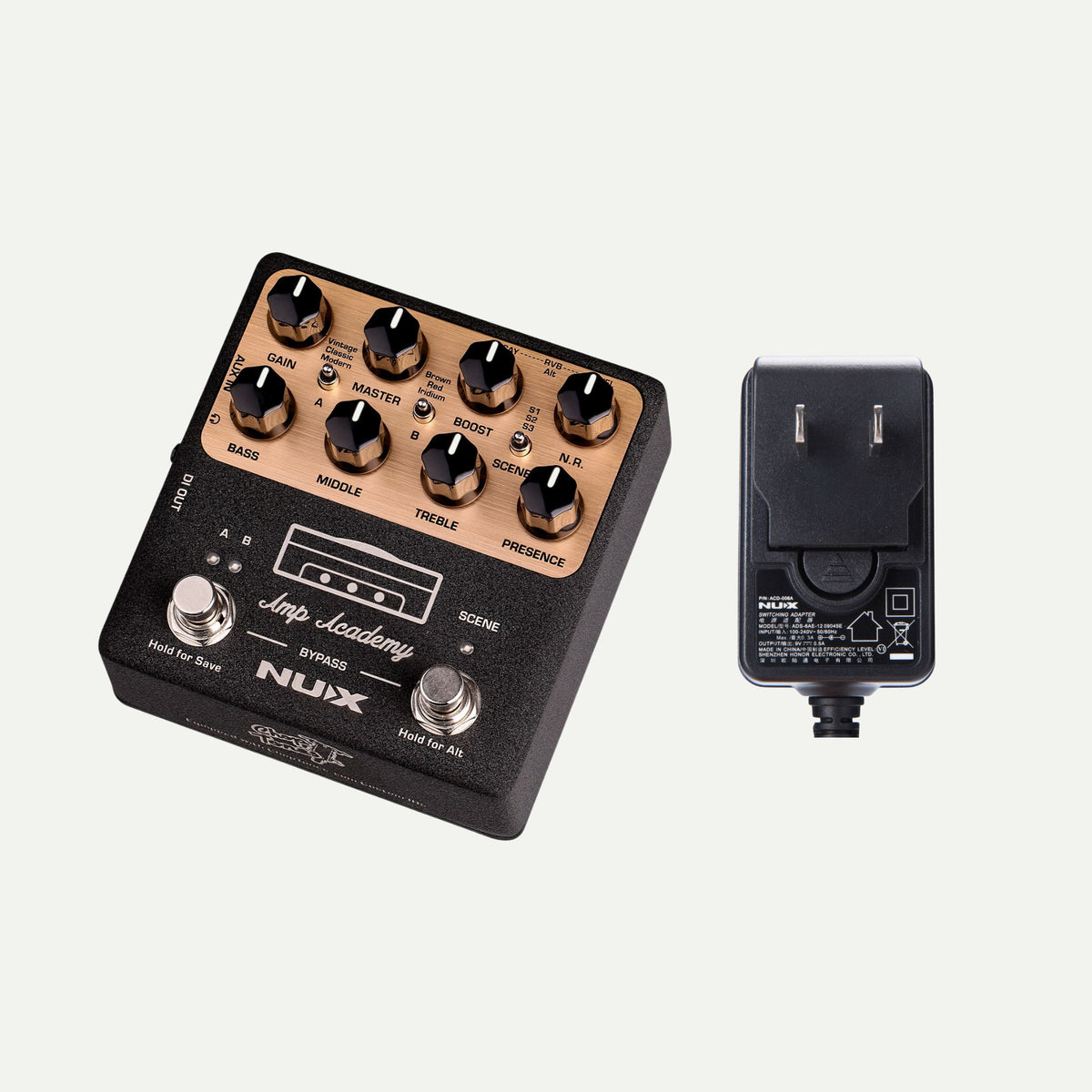 NUX Amp Academy angled view next to the ACD-006A power adapter