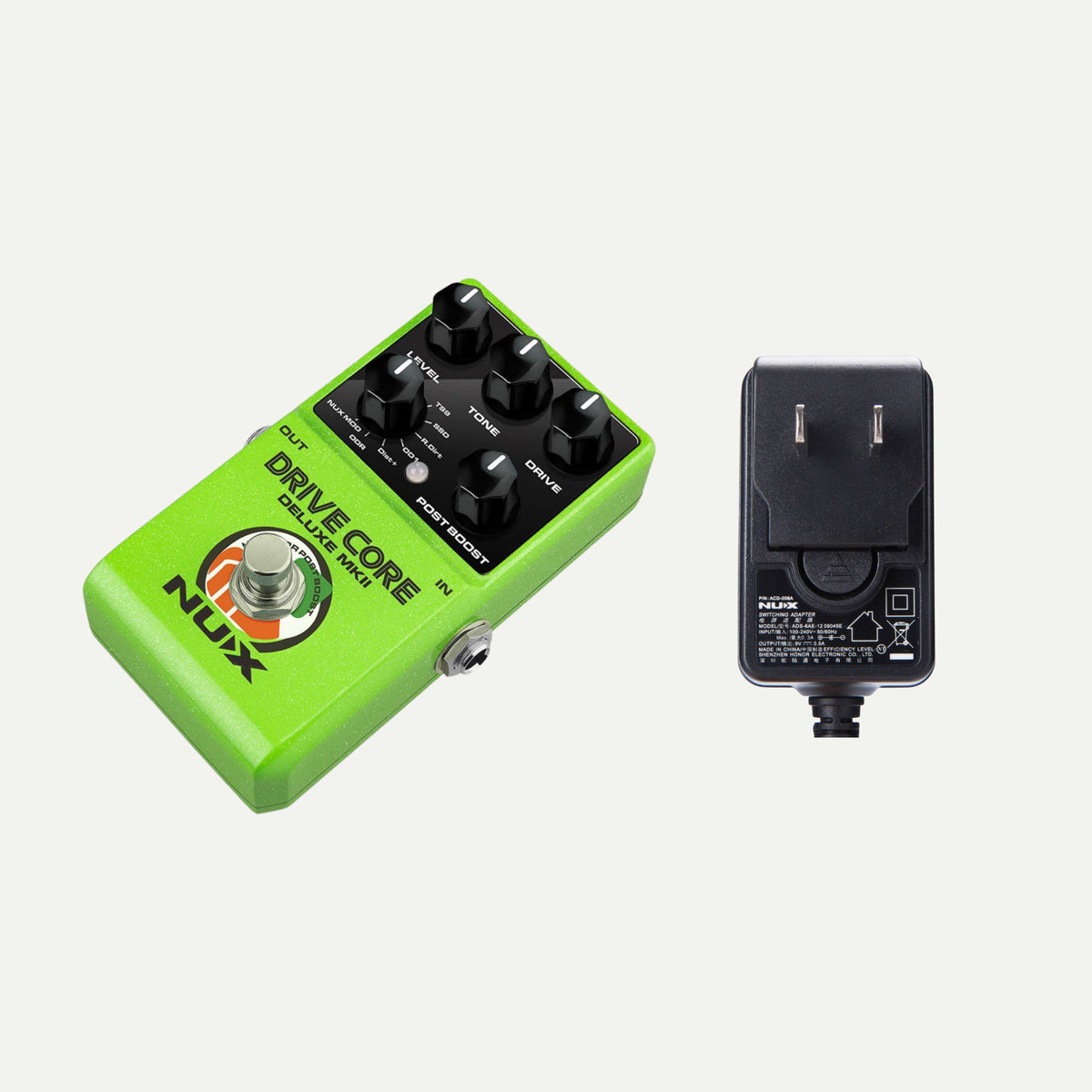 NUX Drive Core Deluxe MKII angled view next to the ACD-006A power adapter