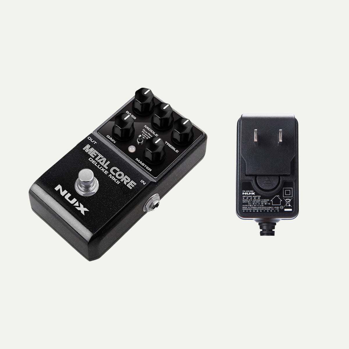 NUX Metal Core Deluxe MKII angled view next to the ACD-006A power adapter