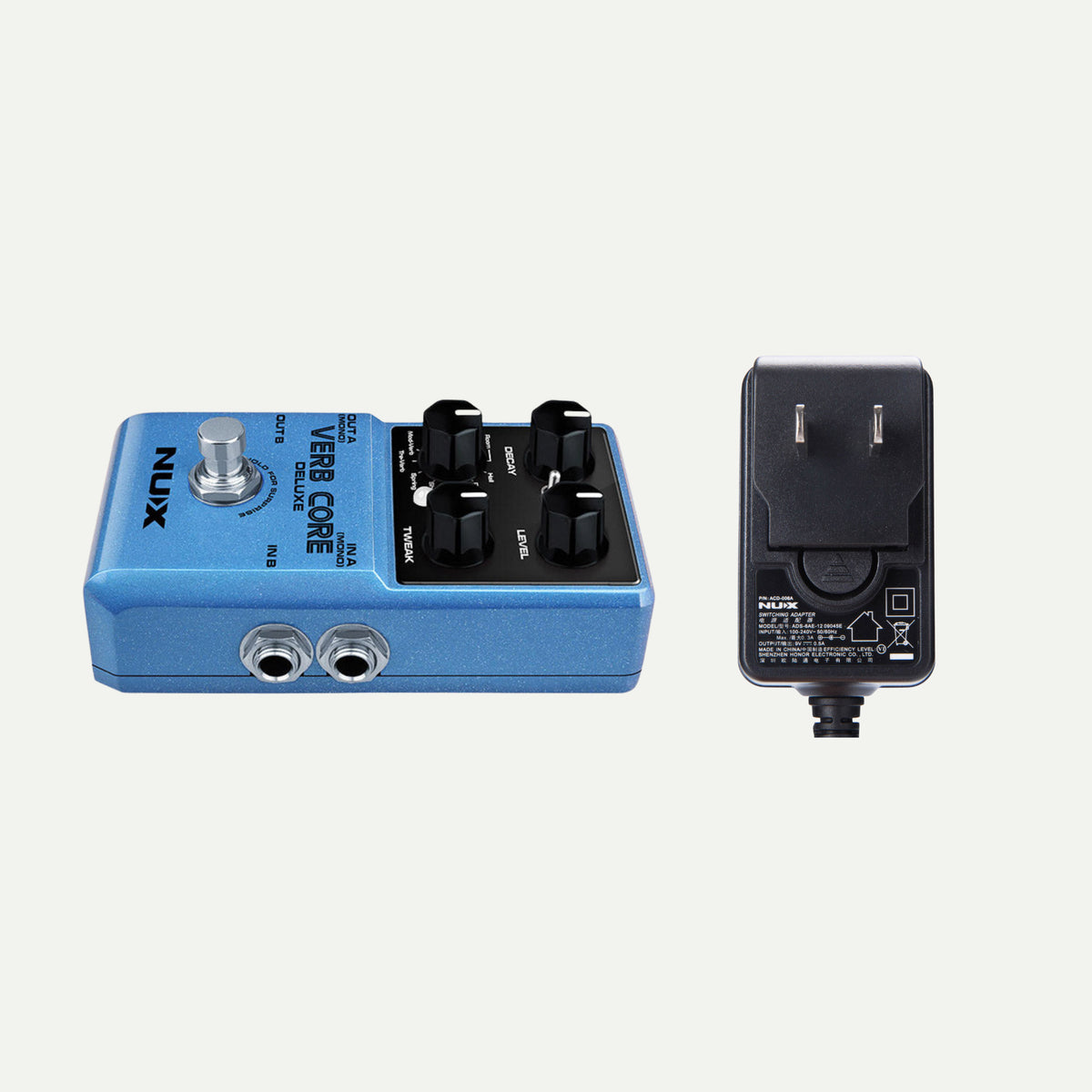NUX Verb Core Deluxe angled view next to the ACD-006A power adapter