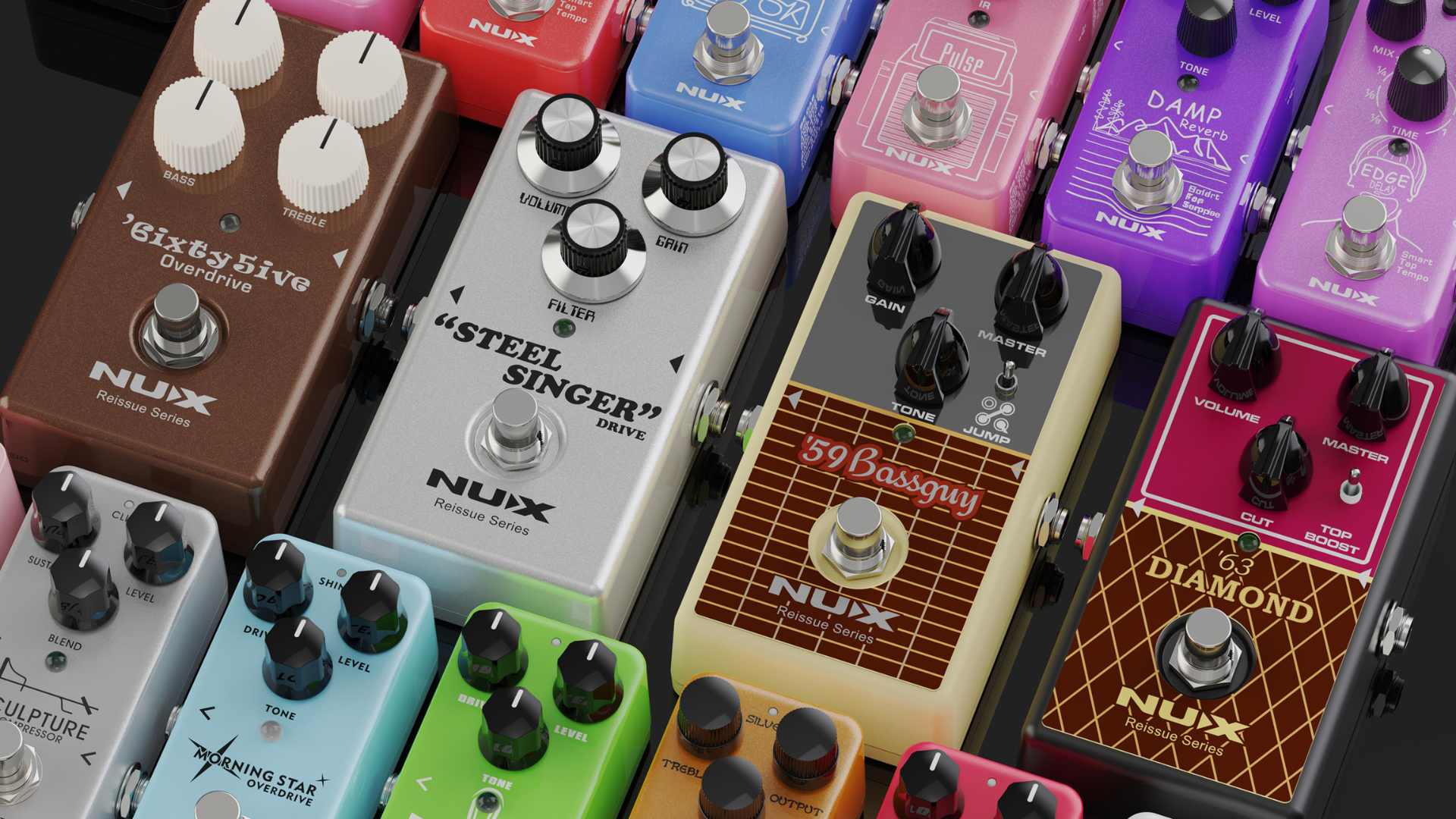 Collection of Nux guitar effect pedals on a dark background