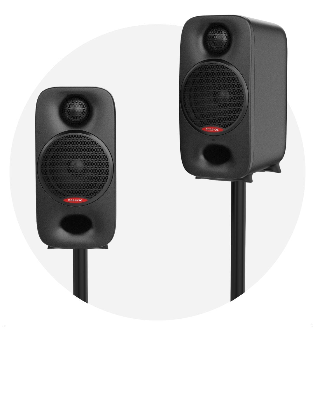 Pair of black nux studio monitors on stands against a white background