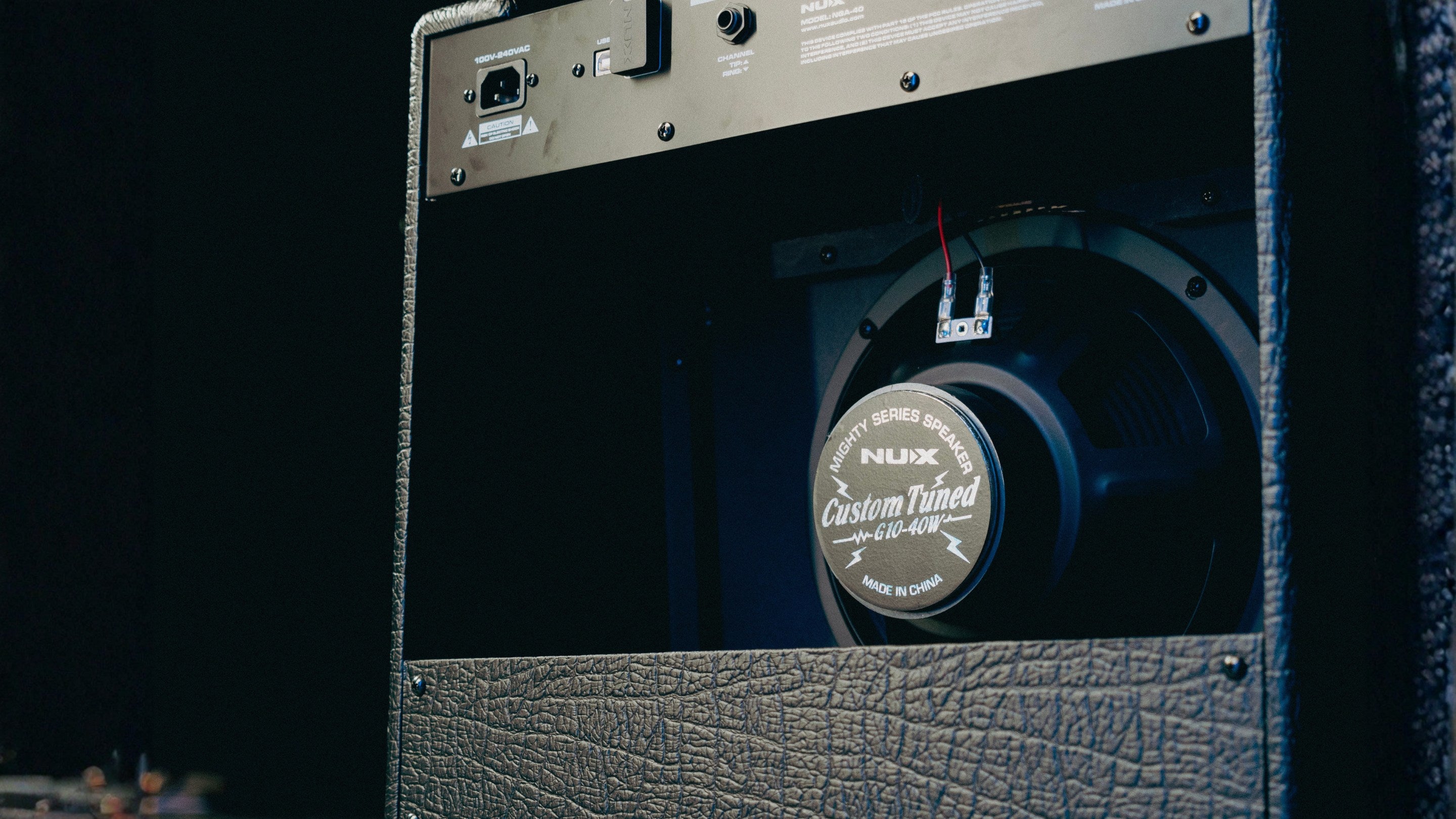 NUX mighty 40 amplifier with custom tuned g10-40w speaker at the back