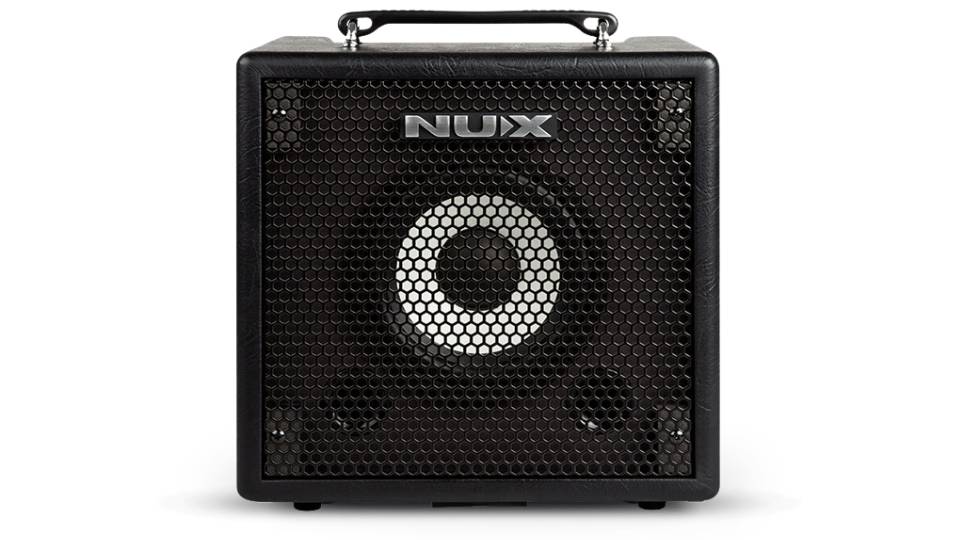 two NUX bass amps in front of an electric drum kit