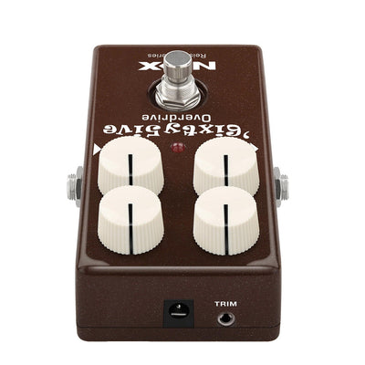 NUX Guitar effects pedal with four knobs on a white background