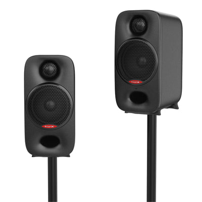 Pair of black NUX studio monitors on stands with on a white background