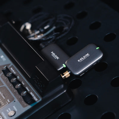 NUX B-7 PSM wireless guitar kit with receiver plugged into the mixer.