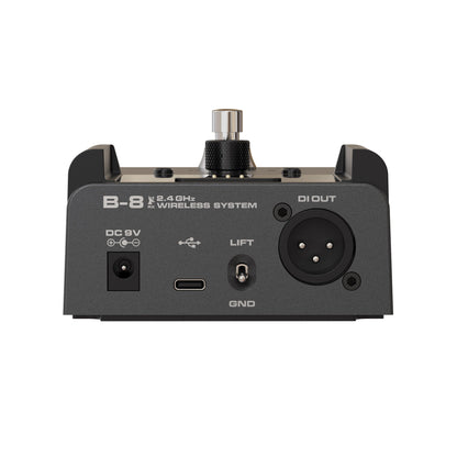 NUX B-8 pedalboard receiver showing the back side panel with the included I/O like DI out, Lift and Ground switch, USB-C port, and a DC 9V barrel plug for power. 2.4 ghz wireless system.