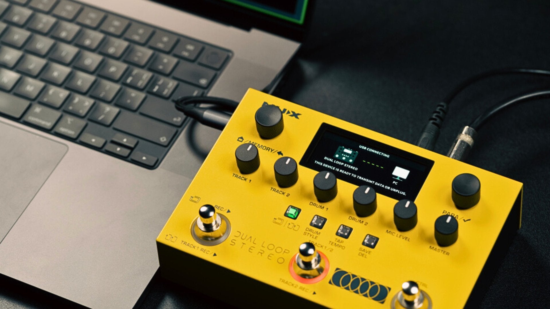 yellow NUX dual loop stereo connected to a laptop via usb