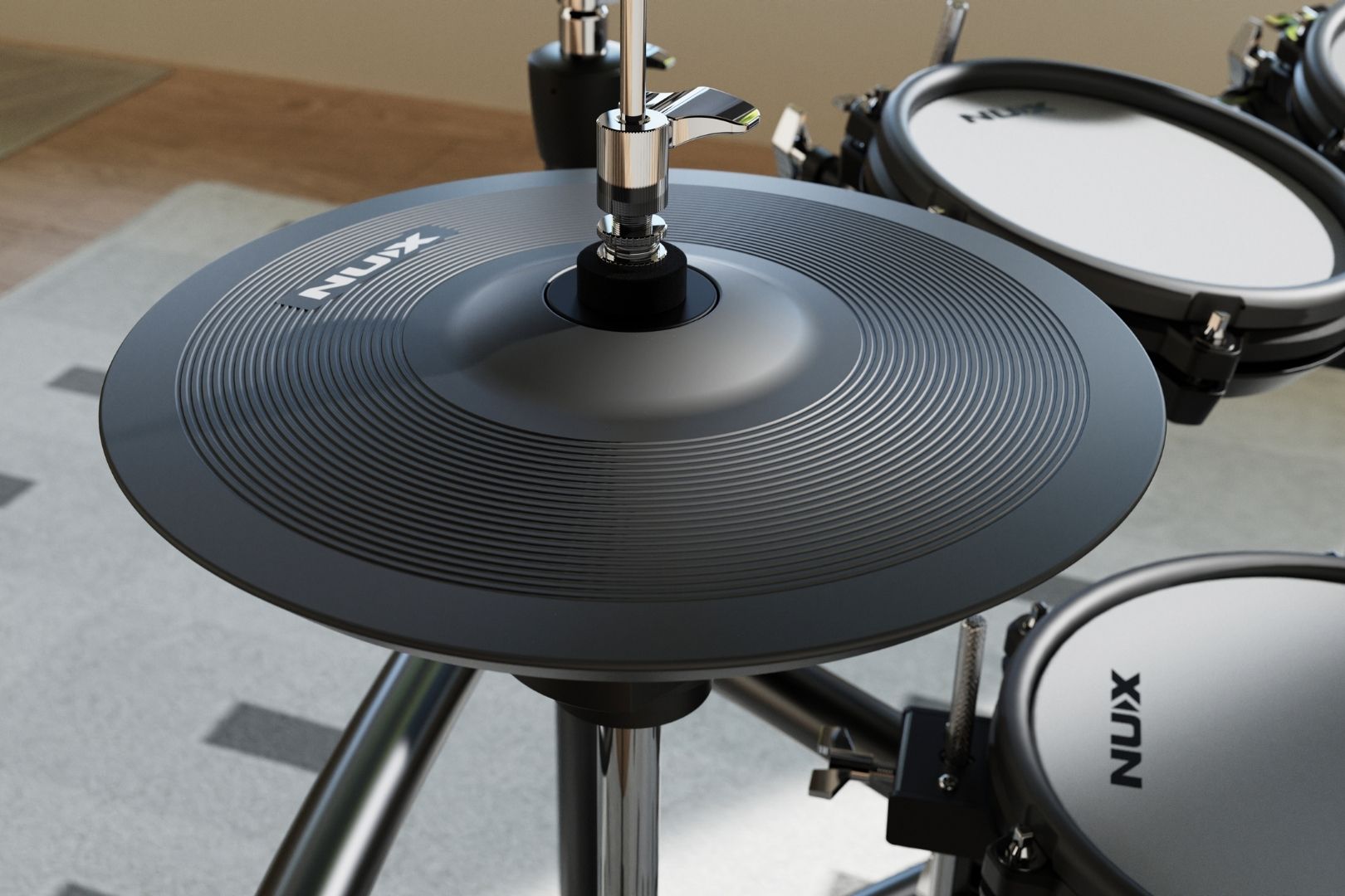 Nux electronic drum hi hat pad on a wooden floor