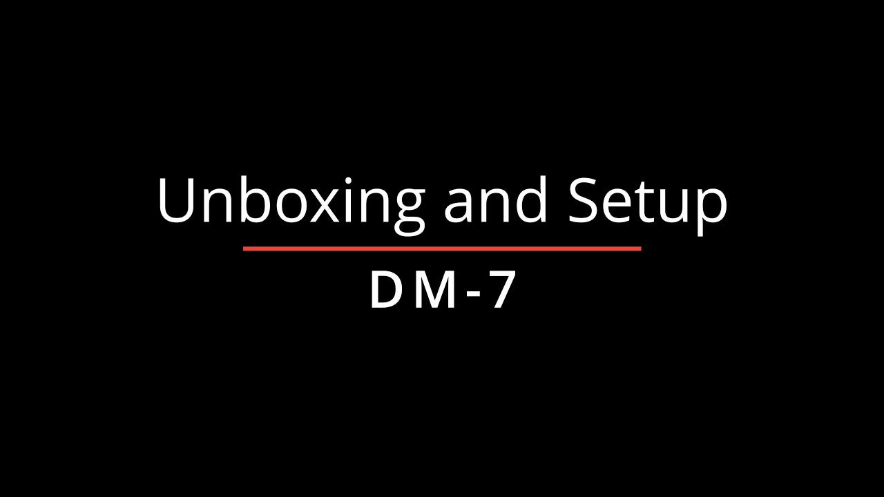 Text 'Unboxing and Setup DM-7' on a black background