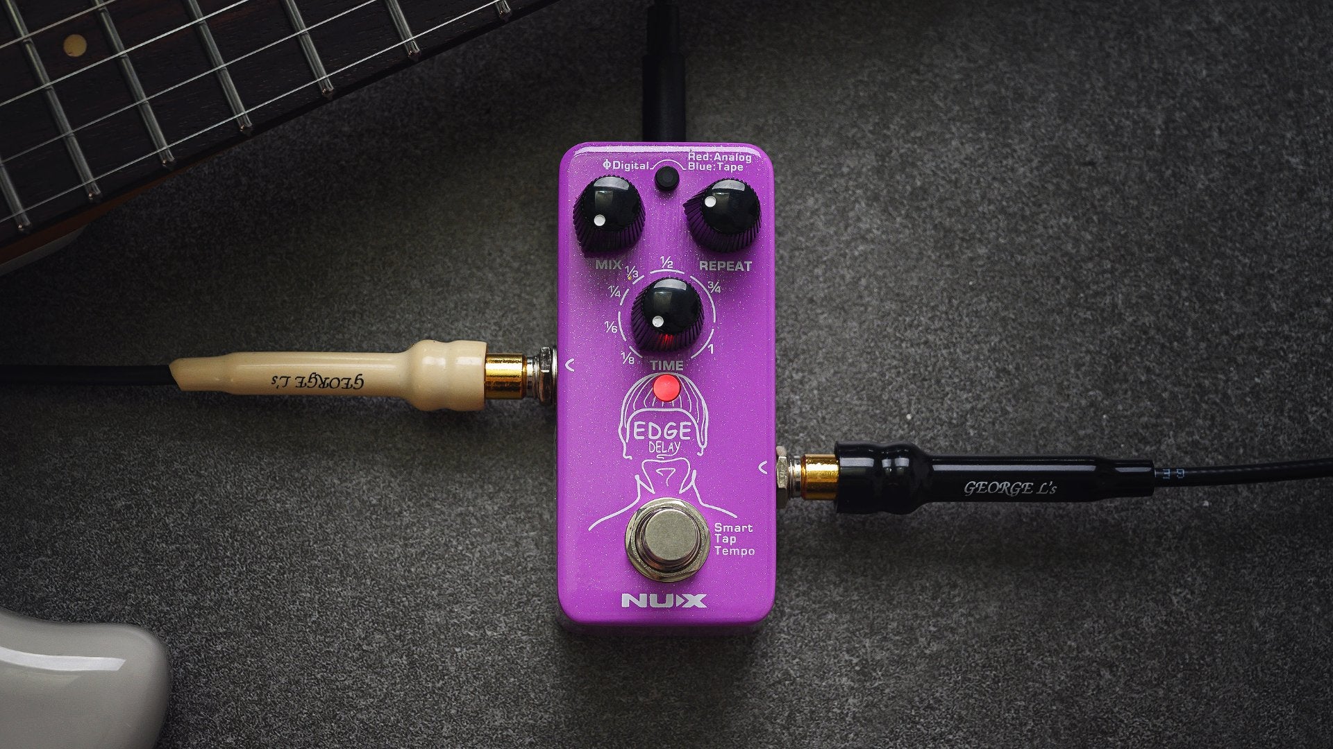 NUX Edge Delay mini core with Input and output jack plugged in.