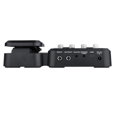 Black MG-101 NUX guitar effects pedal with input, output, and USB ports on a white background