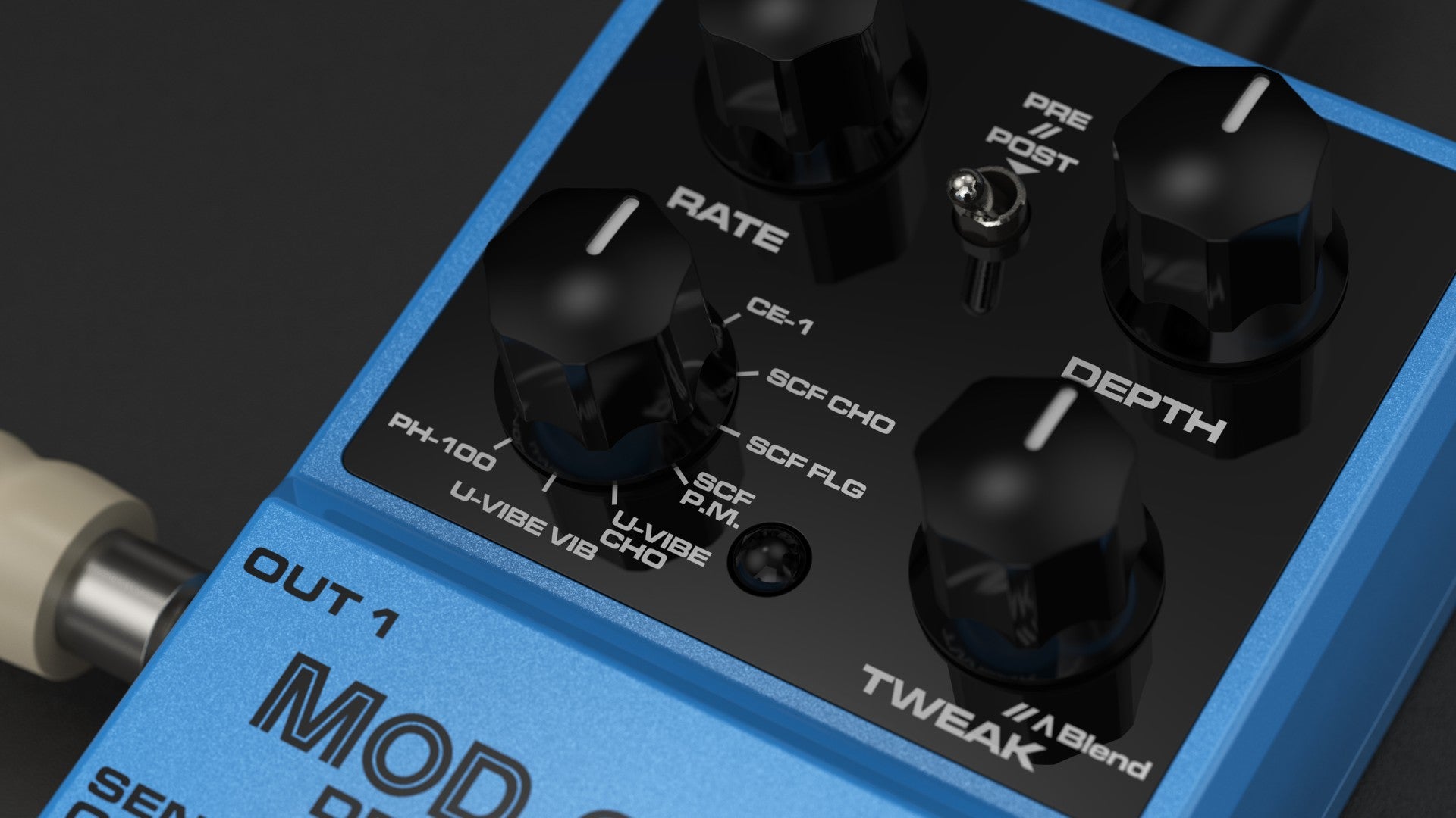 Close-up of a NUX Mod core guitar effects pedal with blue and black design