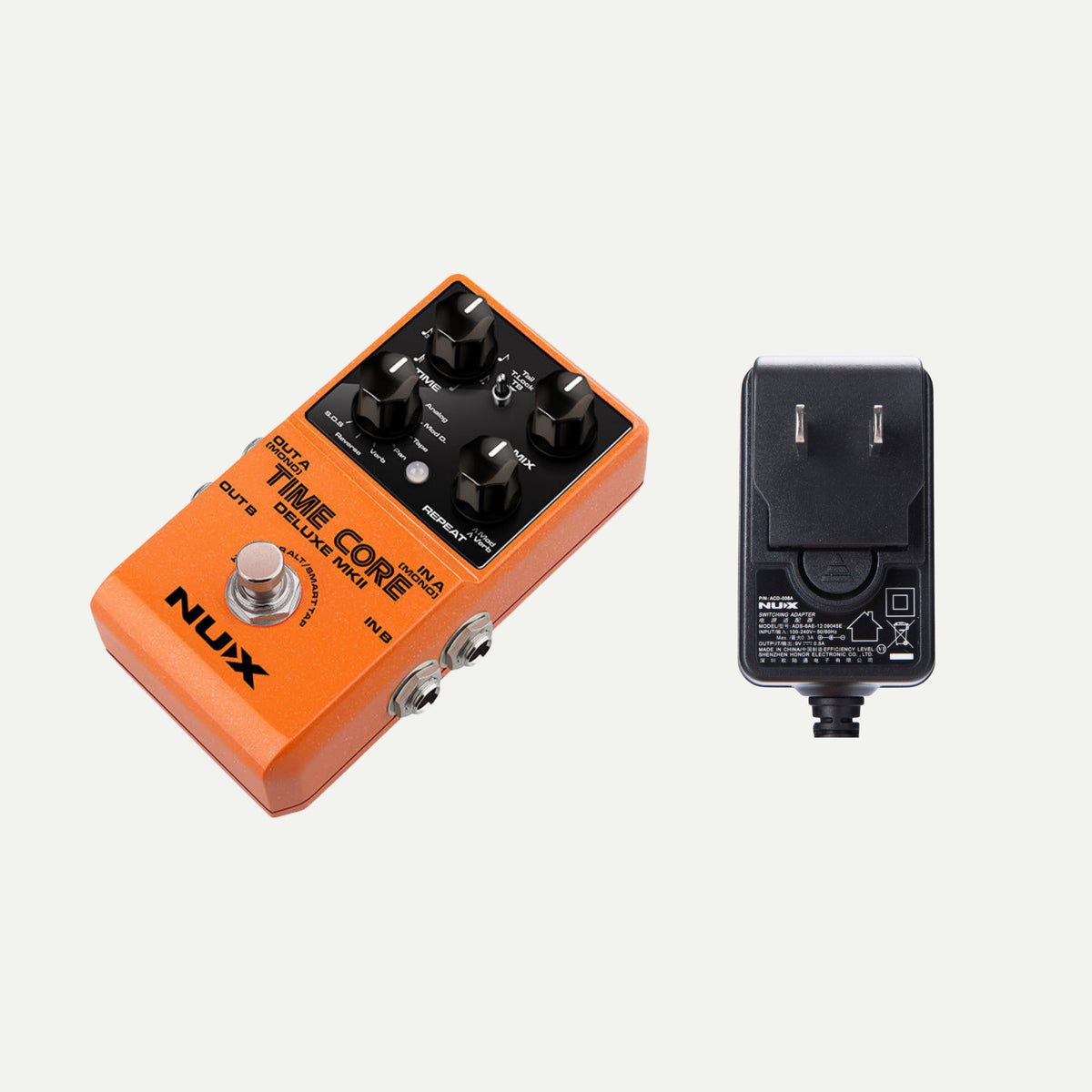 NUX Time Core Deluxe MKII angled view next to the ACD-006A power adapter