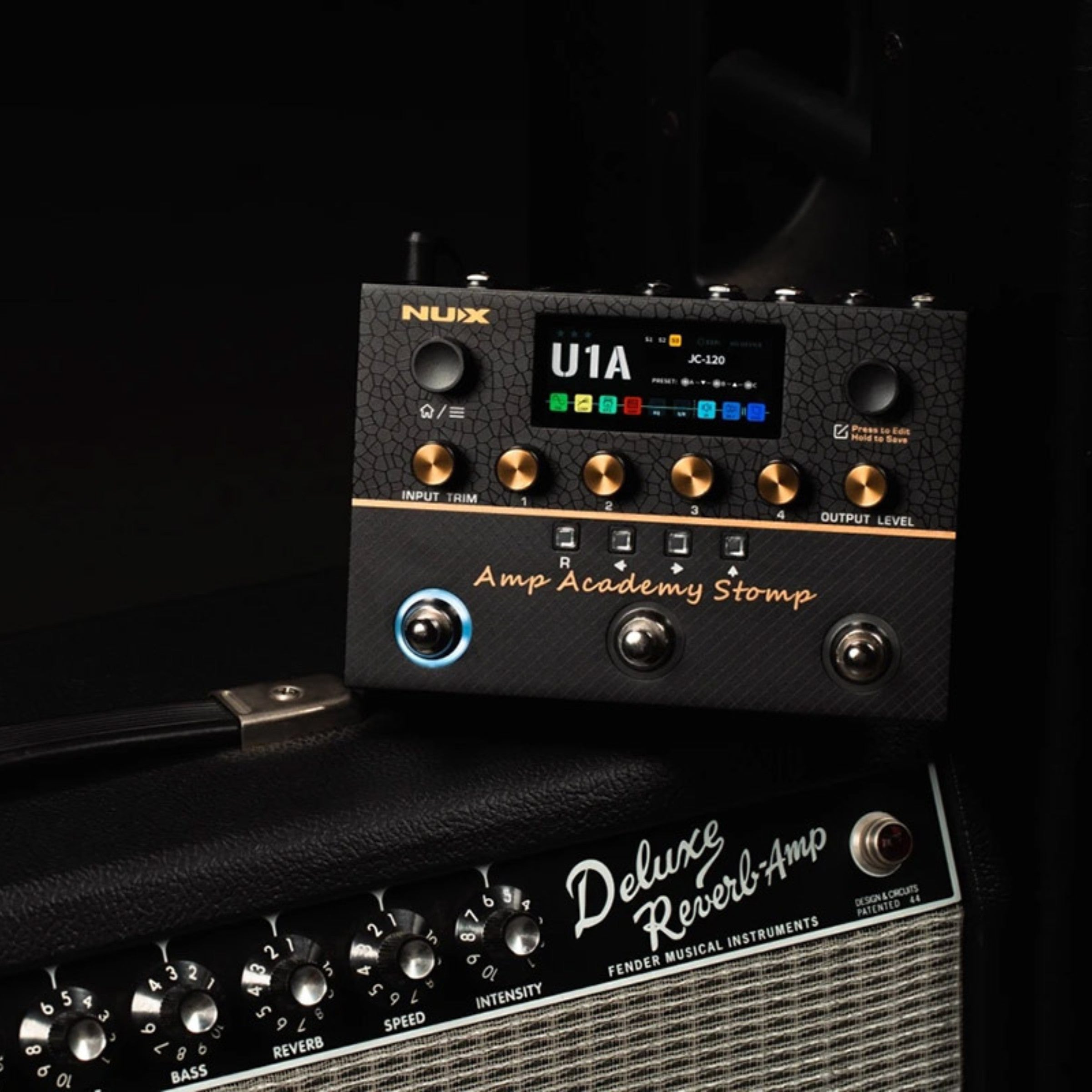 NUX amp academy stomp with LCD screen multi switch pedal stompbox on an amp