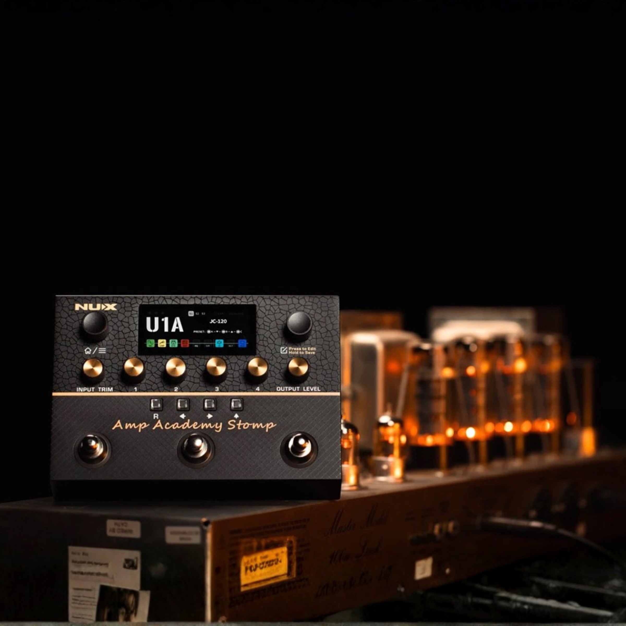 NUX amp academy stomp on top of an amp