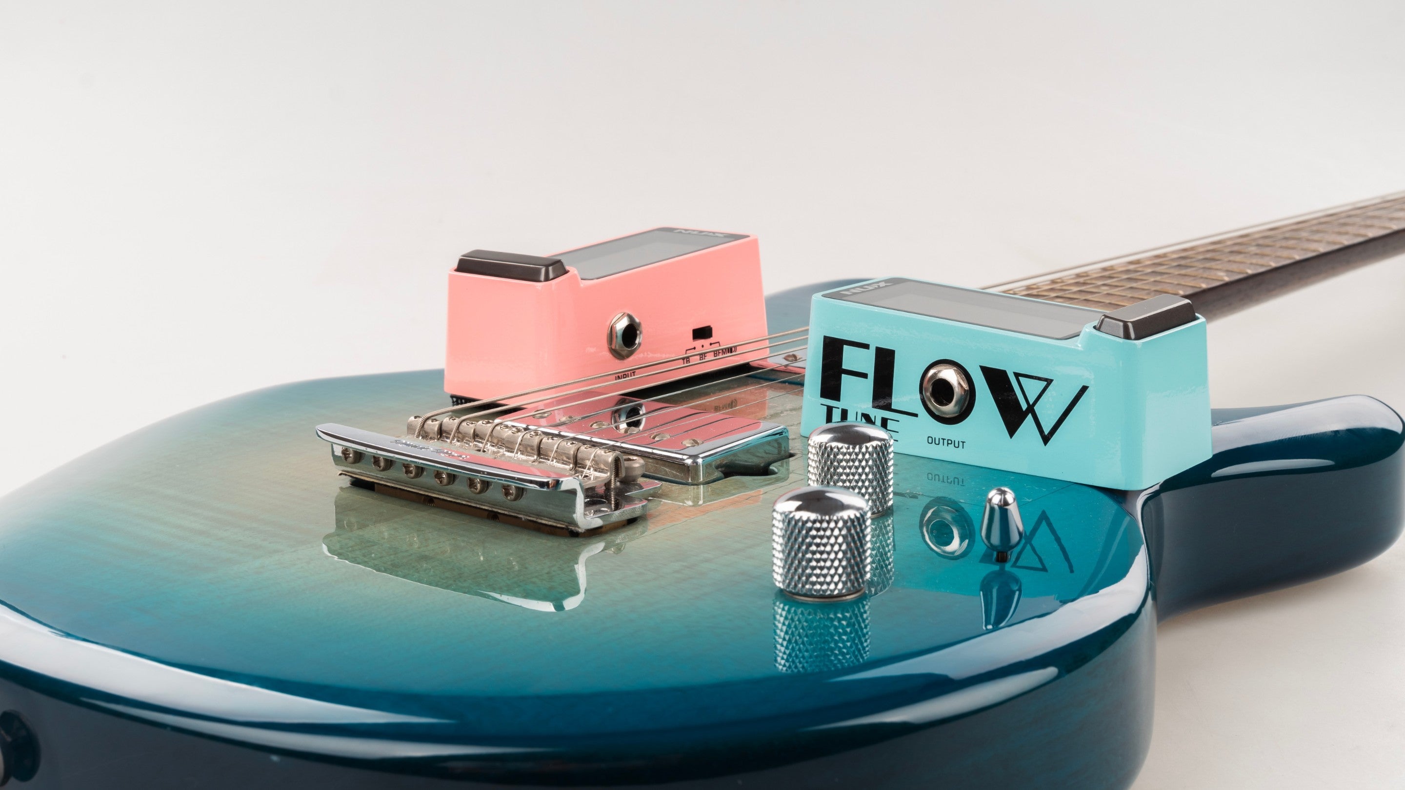 two NUX Flow Tuner pedal on a electric guitar