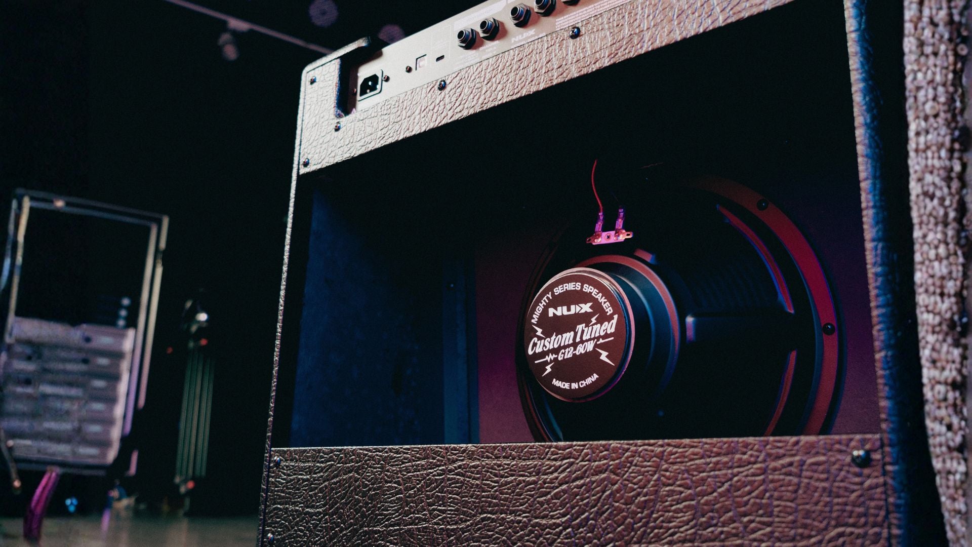 back side of NUX mighty 60 speaker showing custom tuned 612-60watt speaker