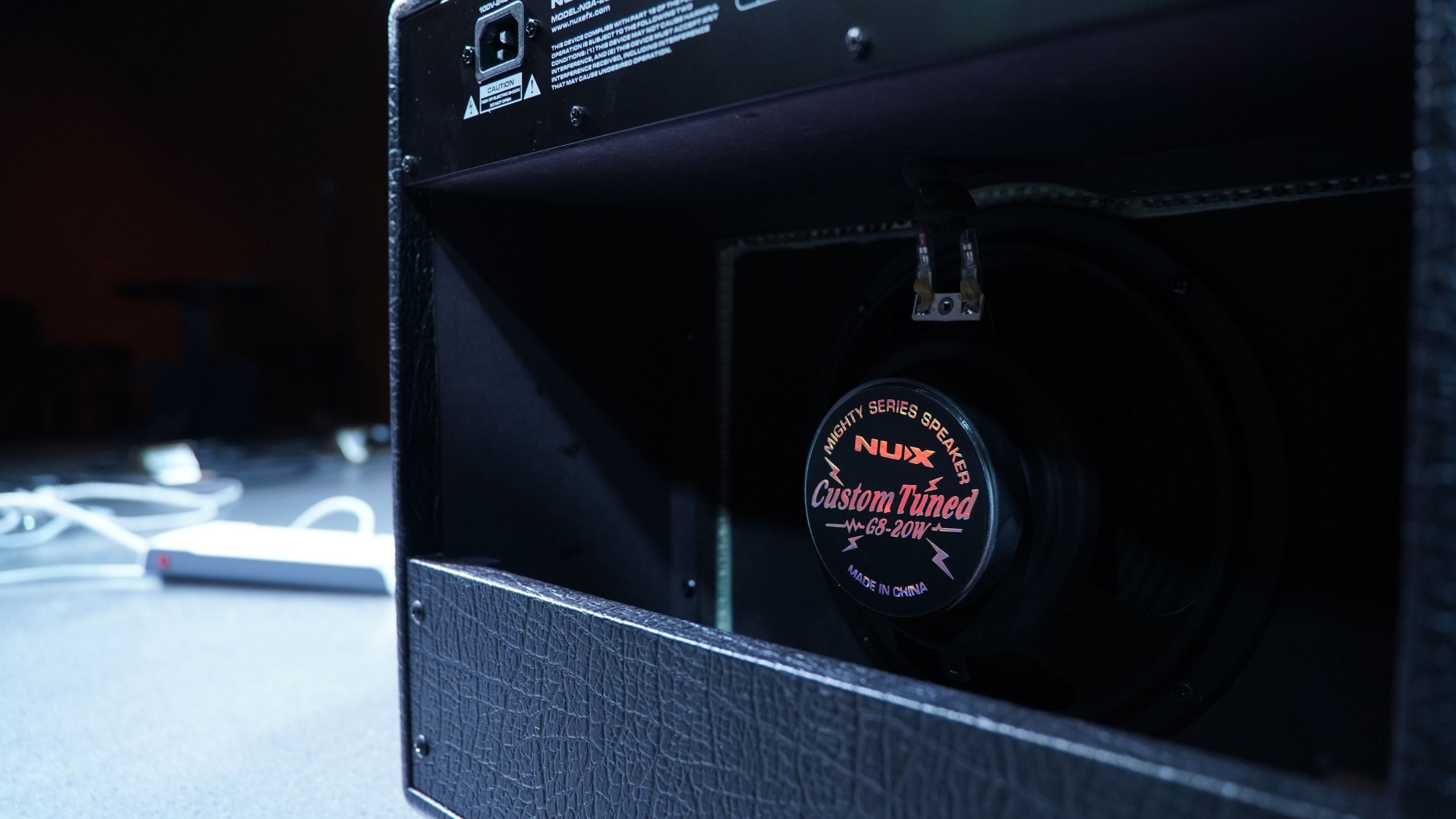 NUX mighty 20 mk2 back panel showing the custom tuned amplifier